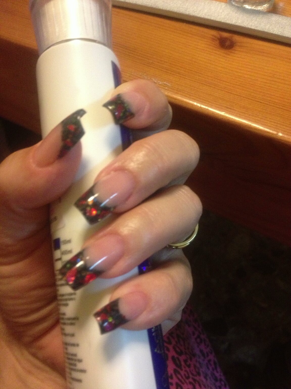 Hand-painted black and red nail art by Beauty On The Move